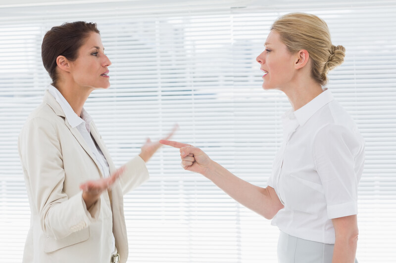 Two Workers having a Workplace Dispute